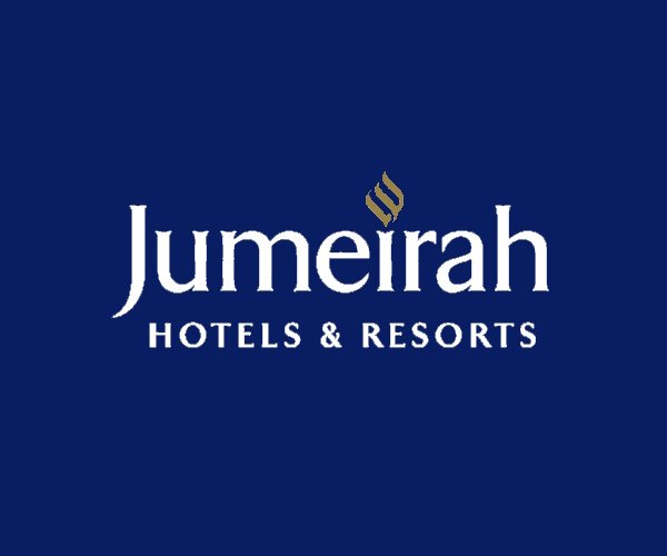 "Jumeirah Hotels & Resorts" logo on a dark blue background, with a gold stylized flame above the word Jumeirah.